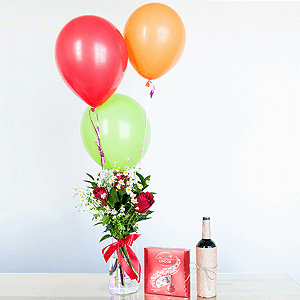 Red rose 50 cm - 7, Chamomile - 3, Aspidistra (1 pc.), Ruscus, Ribbon, Lindt Candy Box, Helium Balloon (1 pc.), Non-alcoholic champagne or wine