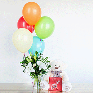Lilies - 4, Pistachio, Ruscus, Ribbon, Taddy Bear 45 cm, Lindt Candy Box, Helium Balloon (1 pc.)
