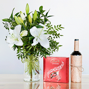 Gift set "Lilies, sweets and non-alcoholic wine" with delivery Astrakhan