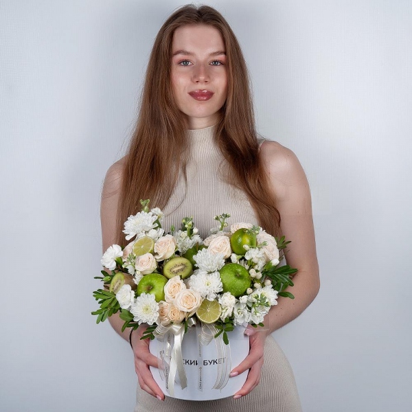 Baltica White Spray Chrysanthemum - 3, Peony sprayrose - 3, White Matthiola - 2, White spray carnation - 3, Round flower box medium, Oasis, Pistachio, Hypericum, Apple, 1 pc., Kiwi, Lemon, 1 pc., Wrapping Paper