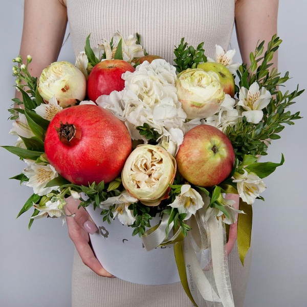 Peony style roses - 3,  White Hydrangea - 1, Alstromeria white, soft pink - 9, White Matthiola - 1, Pistachio, Apple, 1 pc., Pomegranate, Round flower box medium, Oasis, Ribbon, Wooden skewer
