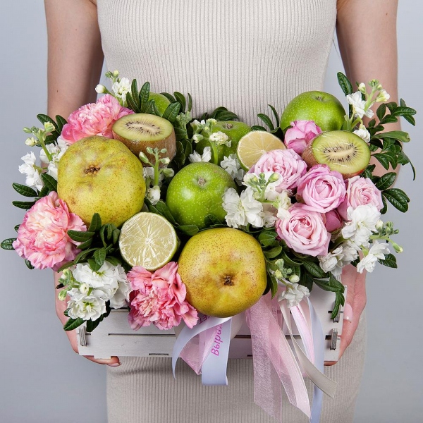 White Matthiola - 3, Peony sprayrose - 1, Pink carnation - 5, Wooden pot, Oasis, Lemon, 1 pc., Kiwi, Apple, 1 pc., Pear, Wooden skewer, Pistachio, Ribbon