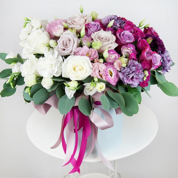Deep Purple rose - 9, Pink rose 50 cm - 6, White rose 50 cm - 6, Pink carnation - 4, Bright pink spray rose mix, 50 cm - 7, Baltica Pink Spray Chrysanthemum - 5, lisianthus - 3, Pink Lisianthus (Eustoma) - 6, Carnation white, cream - 4, Lilac carnation - 4, Round flower box medium, Oasis, Wrapping Paper, Eucalyptus populus (1 pc.)