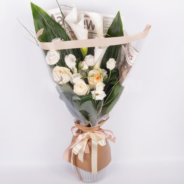 Calla lilies - 3, Peony style roses - 7, lisianthus - 2, Beargrass (1 pc.), Aspidistra (1 pc.), Wrapping Paper, Ribbon