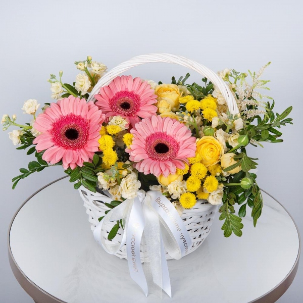 Gerbera pink - 7, Spray rose: yellow, orange 50 cm - 1, White Matthiola - 3, Santini Yellow Spray Chrysanthemum - 7, Small Basket, Oasis, Small Basket, Pistachio, Ribbon, Astilbe