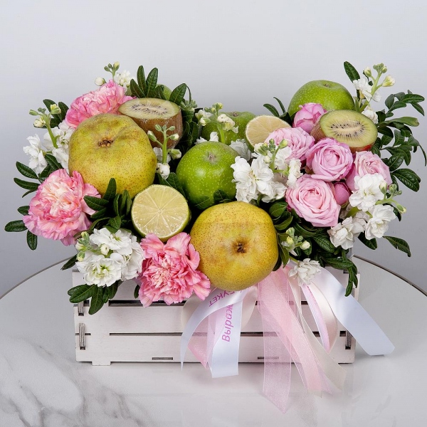 White Matthiola - 3, Peony sprayrose - 1, Pink carnation - 7, Wooden pot, Oasis, Lemon, 1 pc., Kiwi, Apple, 1 pc., Pear, Wooden skewer, Pistachio, Ribbon