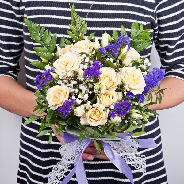 Spray rose: white, cream, light pink 50 cm - 3, Gypsophila - 1, lisianthus - 2, Blue Statice, Oasis, Pistachio, Fern (1 pc.), Wrapping Paper