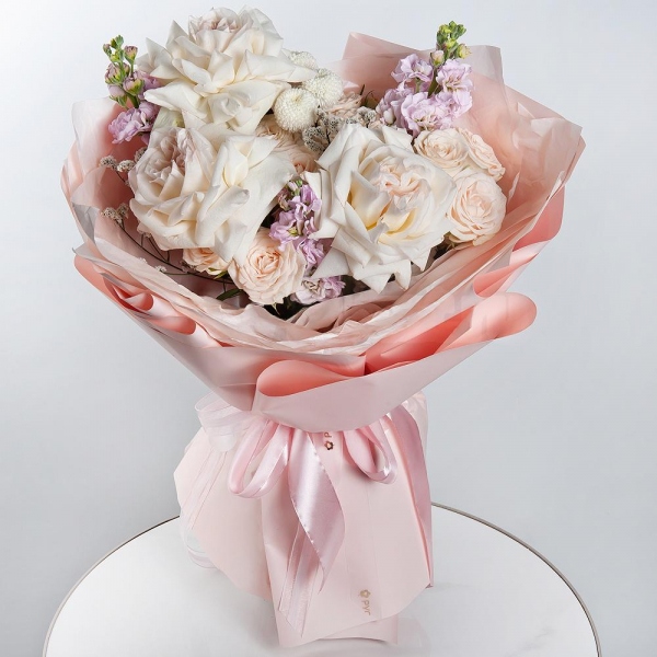Peony style roses - 11, Peony sprayrose - 3, Matthiola Lilac - 3, Newton White Spray Chrysanthemum - 2, Limonium (1 pc.), Wrapping Paper