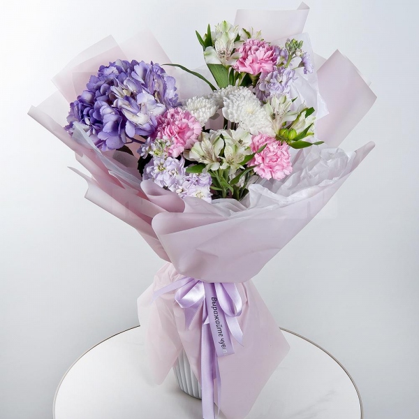 Blue/purple hydrangea - 1, Baltica White Spray Chrysanthemum - 1, Pink carnation - 7, Alstromeria white, soft pink - 5, Matthiola Lilac - 2, Wrapping Paper