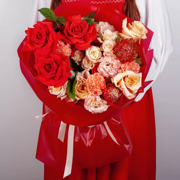 Red rose Nina 50 cm - 7, Cream Rose 50 cm Ecuador (Creme Caramel) - 4, Carnation white, cream - 5, Pink Lisianthus (Eustoma) - 2, Spray rose: white, cream, light pink 50 cm - 2,  Raspberry branch, Wrapping Paper, Nutan