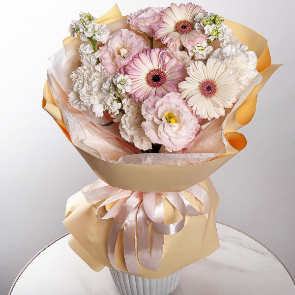 Gerbera pink - 5, Pink Lisianthus (Eustoma) - 2, Carnation white, cream - 5, Baltica White Spray Chrysanthemum - 1, White Matthiola - 3, Wrapping Paper