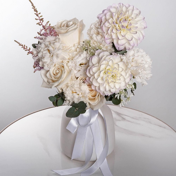 White Dahlia - 2, lisianthus - 3, White rose 50 cm Ecuador - 5, Carnation white, cream - 5, Astilbe, Ozotamnus, Eucalyptus, Ribbon