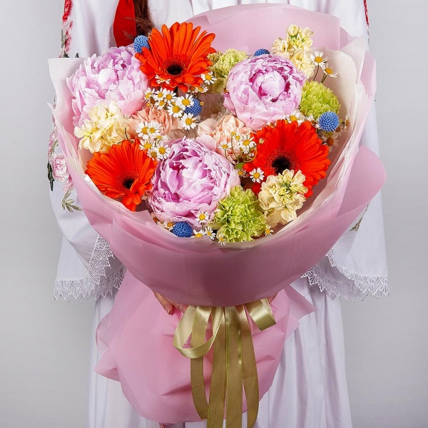 Gerbera daisies - 9, Peony pink - 3, Green carnation - 6, Baltica White Spray Chrysanthemum - 1, Chamomile - 2, White Matthiola - 3, Carnation white, cream - 5, Craspedia, Wrapping Paper