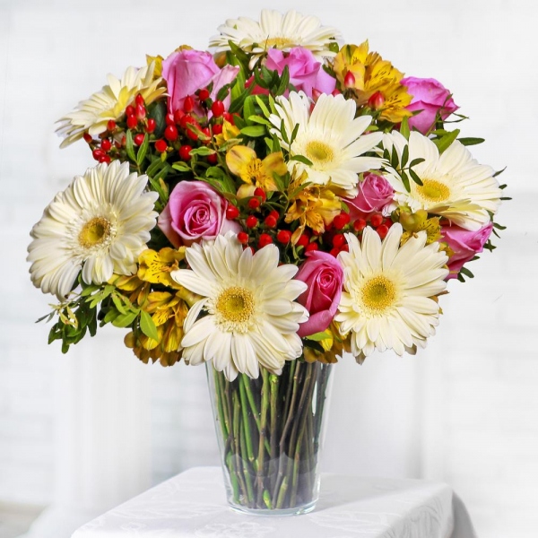Pink rose 50 cm - 9, Gerbera white - 9, Alstromeria Yellow, Orange - 7, Hypericum, Sisal, Ribbon