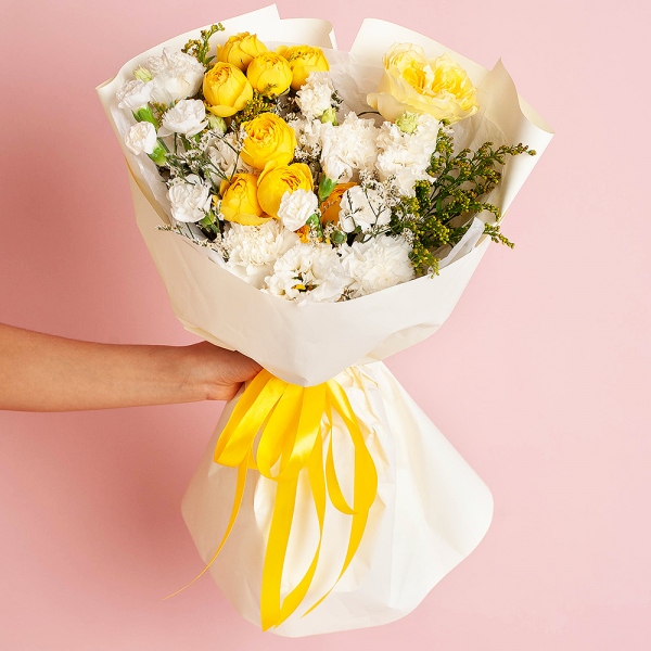 Spray rose: yellow, orange 50 cm - 2, lisianthus - 3, Carnation white, cream - 7, White spray carnation - 7, Rose Yellow 50 cm Ecuador (Mohana, Latina, Brighton) - 1, Solidago (1 pc.), Limonium (1 pc.), Wrapping Paper