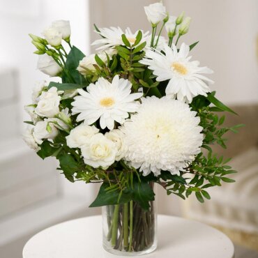 Magnum White Chrysanthemum - 1, Gerbera daisies - 3, lisianthus - 2, Spray rose 50 cm (multiple small blooms on a stem) - 3, Pistachio, Aspidistra (1 pc.), Wrapping Paper, Ribbon