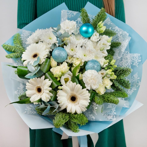 Gerbera white - 5, Spray rose: white, cream, light pink 50 cm - 3, Baltica White Spray Chrysanthemum - 3, lisianthus - 3, Carnation white, cream - 3, Aspidistra (1 pc.), Spruce branches (1pc.), Christmas decor (set), Wrapping Paper
