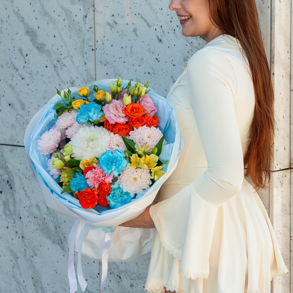 Baltica Pink Spray Chrysanthemum - 2, Magnum White Chrysanthemum - 1, Pink carnation - 2, Carnation white, cream - 5, Pink Lisianthus (Eustoma) - 2, Alstromeria Yellow, Orange - 5, Spray rose: yellow, orange 50 cm - 3, Wrapping Paper