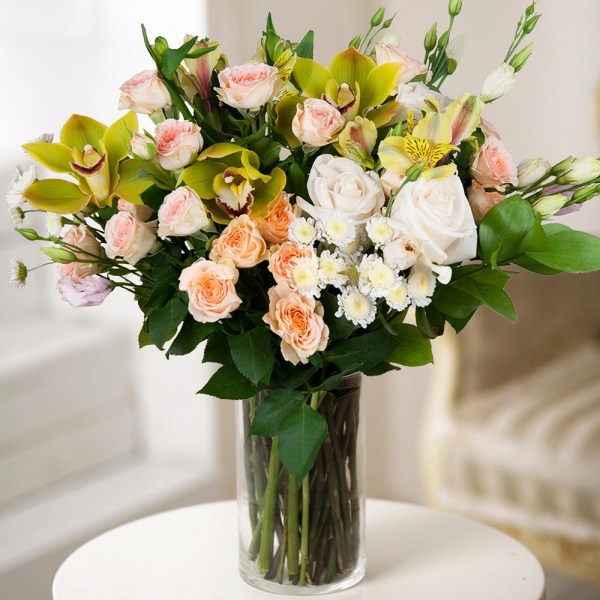 White rose 50 cm - 5, Green Cymbidium Orchid Bud - 4, Pink Lisianthus (Eustoma) - 4, Alstromeria Yellow, Orange - 3, Spray rose: white, cream, light pink 50 cm - 6, Athos poms Stallion - 3, Flask for orchids, Ruscus, Wrapping Paper