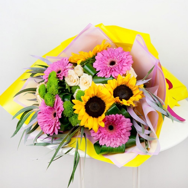 Sunflower - 5, Gerbera pink - 6, Athos pom Feeling Green - 5, Spray rose: white, cream, light pink 50 cm - 3, Aspidistra (1 pc.), Eucalyptus, Wrapping Paper