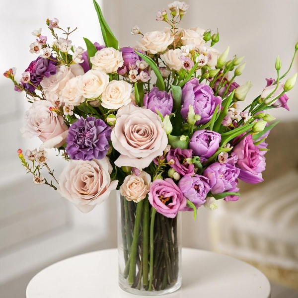 Lilac tulip - 13, Spray rose: white, cream, light pink 50 cm - 4, Pink Lisianthus (Eustoma) - 7, White rose 50 cm - 7, Lilac carnation - 4, Waxflower (1 pc.), Wrapping Paper