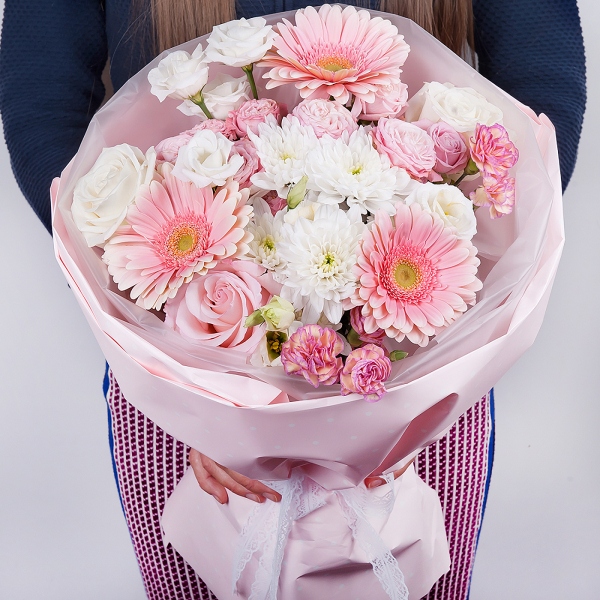 Gerbera pink - 5, Pink rose 50 cm - 3, White rose 50 cm - 3, Baltica White Spray Chrysanthemum - 1, Peony sprayrose - 2, Pink spray carnation - 2, lisianthus - 2, Wrapping Paper
