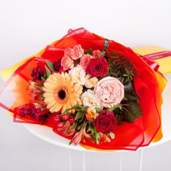 Gerbera daisies - 1, Spray rose: white, cream, light pink 50 cm - 1, Peony rose Kahala 50 cm - 1, Red rose 50 cm - 3, Carnation spray - 2, Alstromeria Yellow, Orange - 3, Bright pink spray rose mix, 50 cm - 2, Hypericum, Wrapping Paper