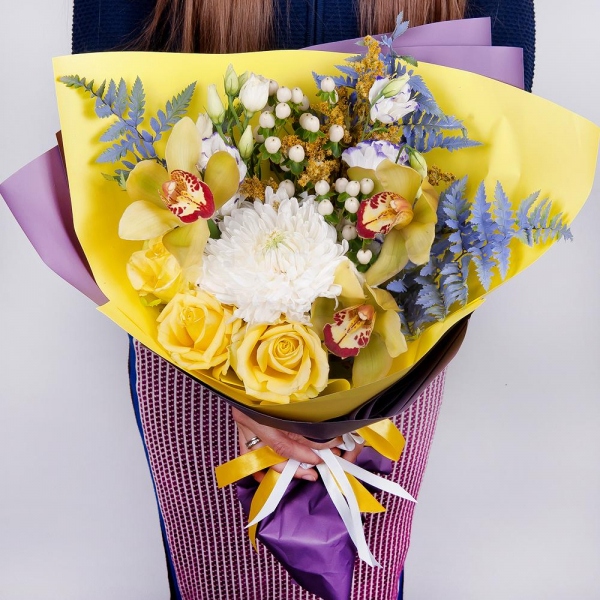 Magnum White Chrysanthemum - 2, Orchid bud yellow/brown Cymbidium - 3, Purple Lisianthus (Eustoma) - 4, Yellow rose 50 cm - 4, Flask for orchids, Hypericum, Solidago (1 pc.), Fern (1 pc.), Wrapping Paper