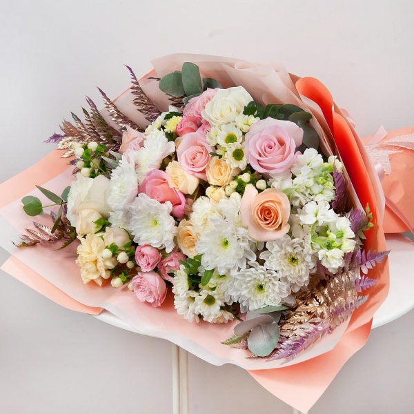 Baltica White Spray Chrysanthemum - 3, Santini White Spray Chrysanthemum - 3, Spray rose: white, cream, light pink 50 cm - 2, Carnation white, cream - 3, Peony sprayrose - 3, White Matthiola - 2, Pink rose 50 cm - 4, White rose 50 cm - 3, Rose Cream 50 cm - 3, Hypericum, Eucalyptus Cinerea, Pistachio, Fern (1 pc.), Wrapping Paper