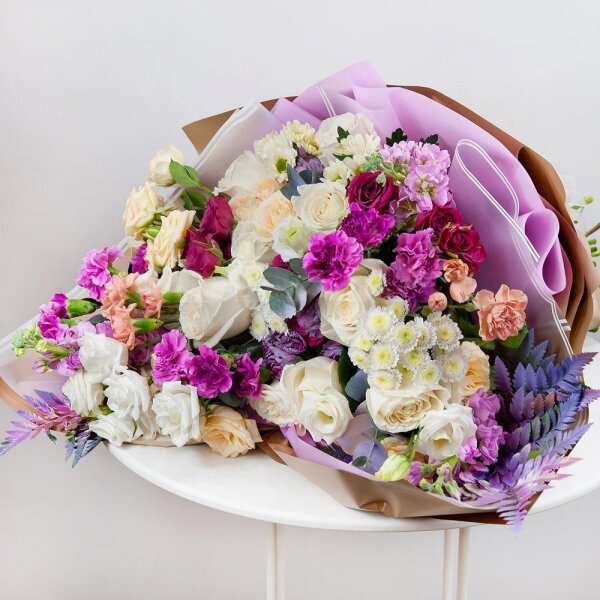 White rose 50 cm - 11, Pink spray carnation - 10, lisianthus - 3, Athos poms Stallion - 2, Santini White Spray Chrysanthemum - 3, Spray rose: white, cream, light pink 50 cm - 9, Pink Matthiola - 3, Pistachio, Fern (1 pc.), Wrapping Paper
