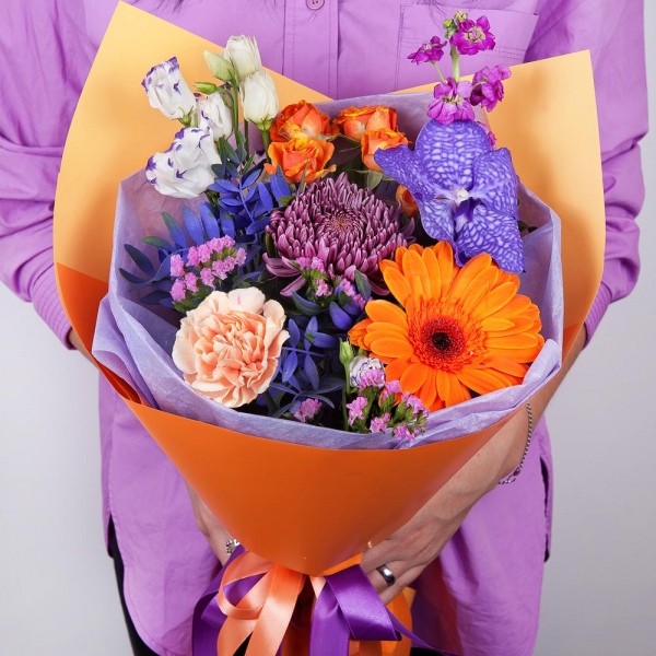 Chrysanthemum Bigoudi purple - 1, Spray rose: yellow, orange 50 cm - 2, Carnation white, cream - 3, Matthiola Lilac - 2, Gerbera daisies - 1, Vanda Orchid bud - 2, Purple Lisianthus (Eustoma) - 2, Flask for orchids, Pistachio, Wrapping Paper, Pink Statice