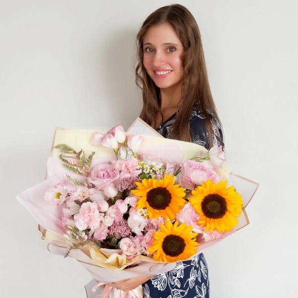 Sunflower - 3, Pink carnation - 7, Pink Lisianthus (Eustoma) - 2, Pink rose 50 cm - 5, Chamomile - 3, Peony sprayrose - 3, Ozotamnus, Fern (1 pc.), Wrapping Paper