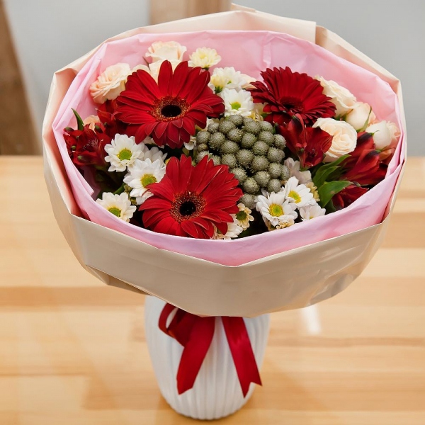 Gerbera red - 3, Santini White Spray Chrysanthemum - 4, Spray rose: white, cream, light pink 50 cm - 3, Alstromeria Red, Bright Pink - 3, Brunia Green Lanuginosa (1 pc.), Wrapping Paper, Ribbon
