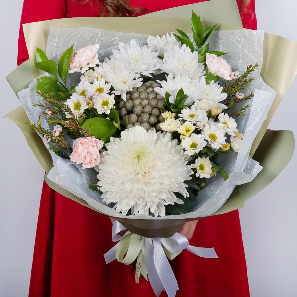 Magnum White Chrysanthemum - 1, Baltica White Spray Chrysanthemum - 2, Carnation white, cream - 5, Santini White Spray Chrysanthemum - 2, Brunia Green Lanuginosa (1 pc.), Waxflower (1 pc.), Ruscus, Wrapping Paper, Ribbon
