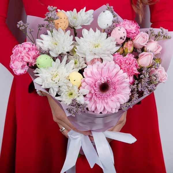 Bright pink spray rose mix, 50 cm - 2, Baltica White Spray Chrysanthemum - 2, Gerbera pink - 1, Pink carnation - 5, Limonium (1 pc.), Easter eggs (3 pc.), Wrapping Paper, Ribbon