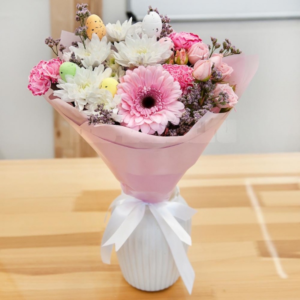 Bright pink spray rose mix, 50 cm - 2, Baltica White Spray Chrysanthemum - 2, Gerbera pink - 1, Pink carnation - 5, Limonium (1 pc.), Easter eggs (3 pc.), Wrapping Paper, Ribbon