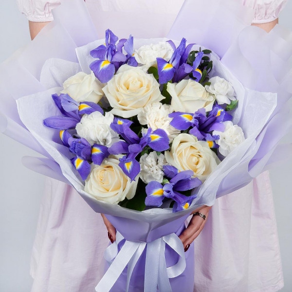 Irises - 9, White rose 50 cm - 5, White spray carnation - 2, Carnation white, cream - 5, Wrapping Paper