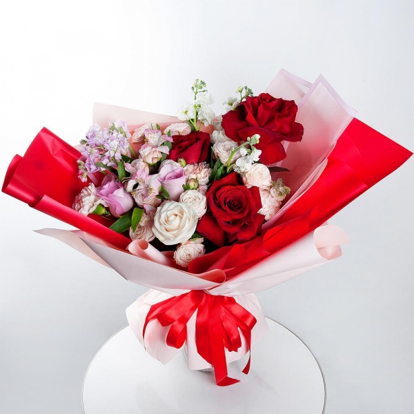 Rose Red 50 cm Ecuador - 3, White Matthiola - 2, Carnation white, cream - 6, Alstromeria white, soft pink - 5, Peony sprayrose - 3, Pink rose 50 cm - 2, White rose 50 cm - 2, Pink Matthiola - 2, Wrapping Paper