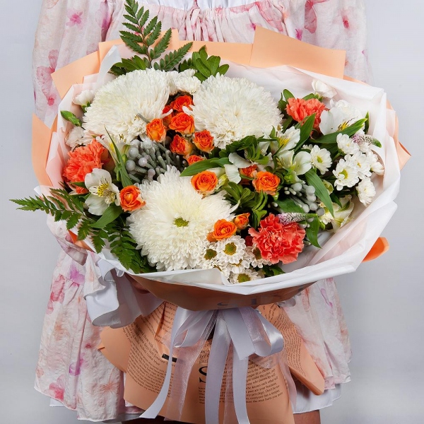 Magnum White Chrysanthemum - 3, Santini White Spray Chrysanthemum - 4, Spray rose: yellow, orange 50 cm - 3, Orange carnation - 5, White spray carnation - 5, Alstromeria white, soft pink - 5, Fern (1 pc.), Pistachio, Brunia Green Lanuginosa (1 pc.), Veronica spray, Wrapping Paper