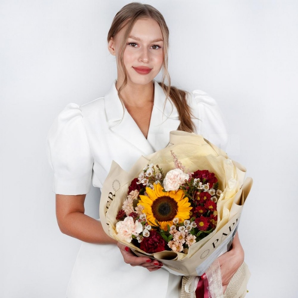 Sunflower - 1, Daisy poms Santini pink, purple - 6, Carnation red - 5, Carnation white, cream - 4, Waxflower (1 pc.), Astilbe, Pistachio, Wrapping Paper
