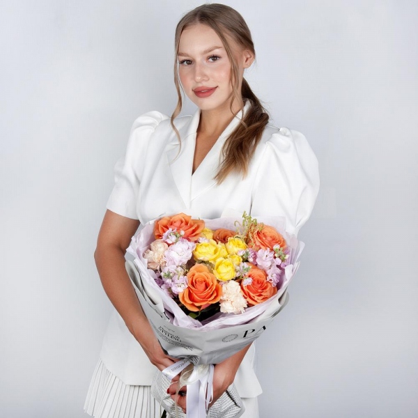 Rose Orange 50 cm Ecuador (High Magic, High Yollow Magic) - 7, Spray rose: yellow, orange 50 cm - 1, Baltica White Spray Chrysanthemum - 1, Carnation white, cream - 6, Matthiola Lilac - 2, Astilbe, Wrapping Paper